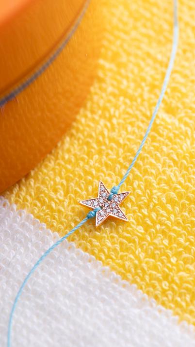 String bracelet with diamond-paved star in rose gold - Redline - 0++